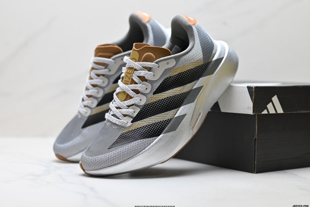 Exclusive Adidas K81801550 Unisex Running Shoes #10 — White/Black/Gold — Size EU 36 / US M4 / W5.5 / 23CM — Side View
