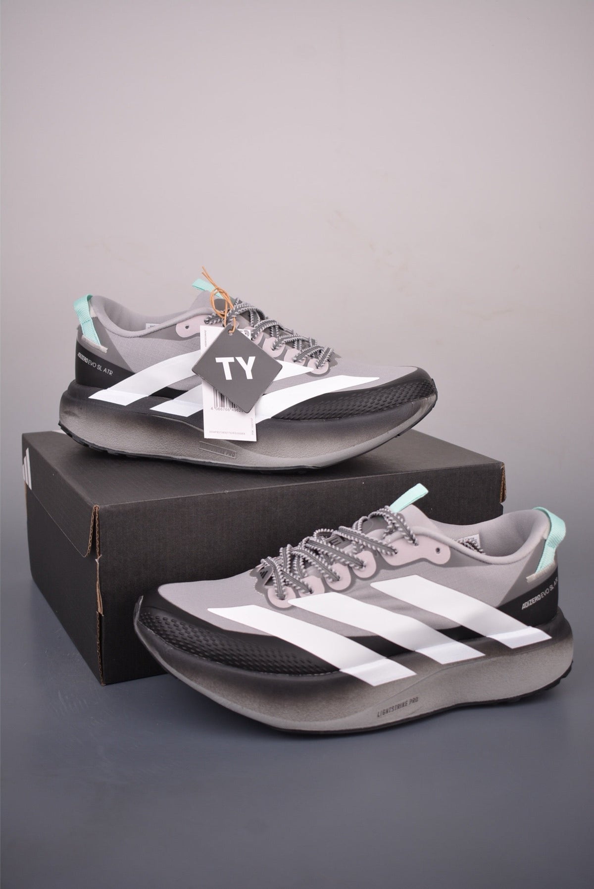 Exclusive Adidas KK01650 Unisex Running Shoes — Grey/White — Size EU 36 / US M4 / W5.5 / 23CM — Side View