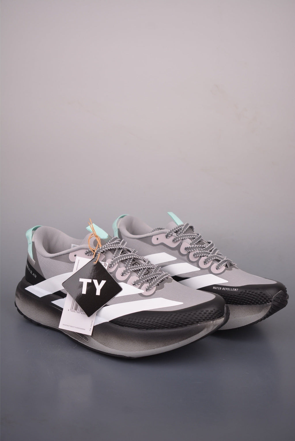 Exclusive Adidas KK01650 Unisex Running Shoes — Grey/White — Size EU 36 / US M4 / W5.5 / 23CM — Detail View