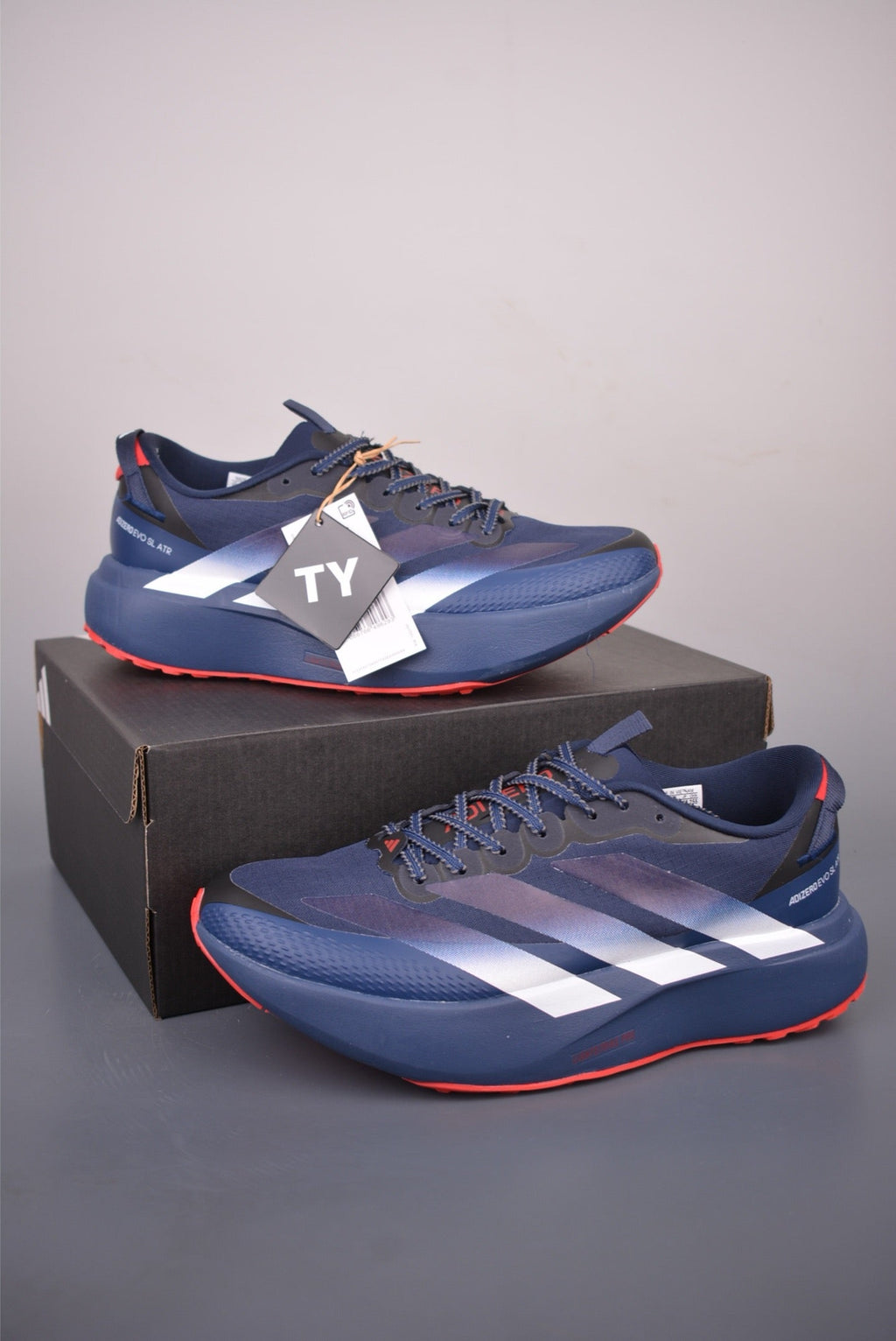 Exclusive Adidas KK01650 Unisex Running Shoes — Grey/White — Size EU 36 / US M4 / W5.5 / 23CM — Lifestyle View