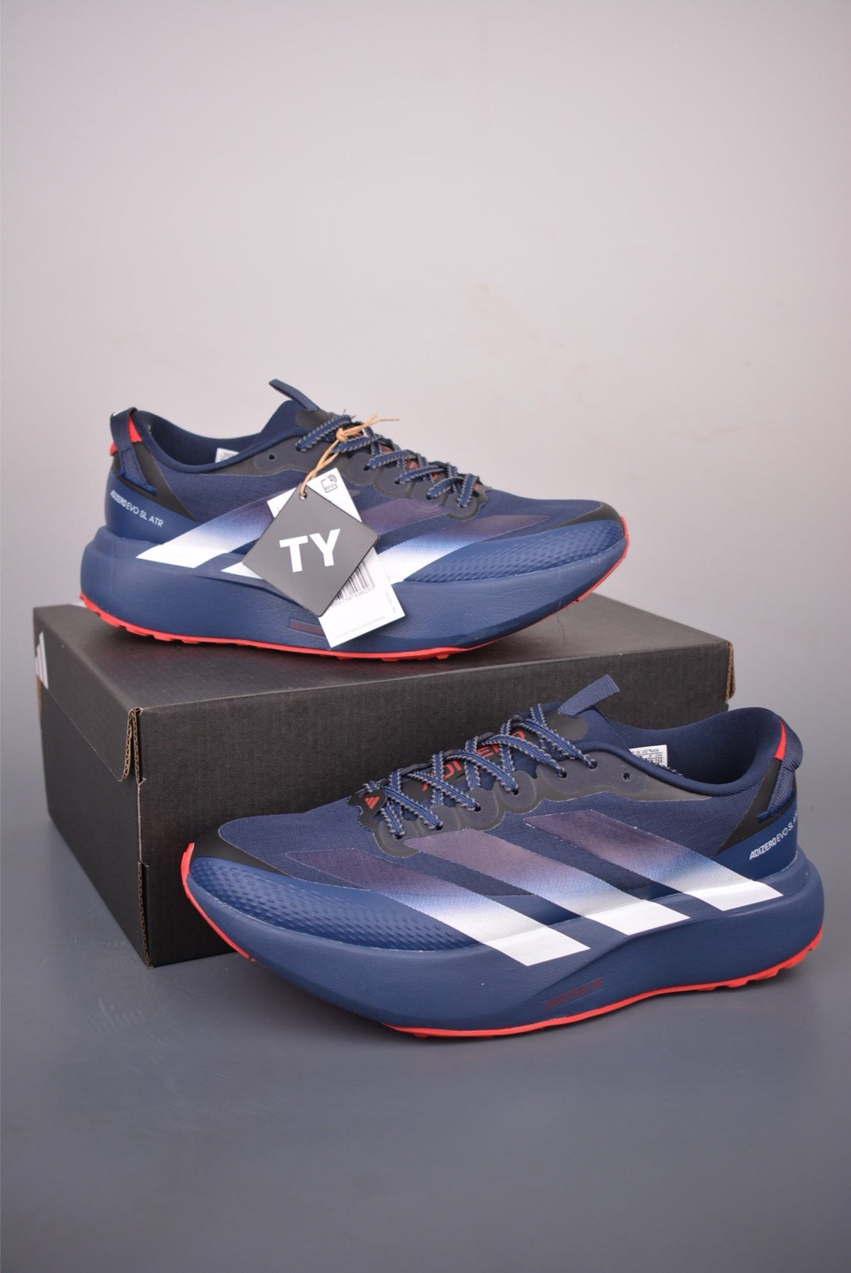 Exclusive Adidas KK01650 Unisex Running Shoes — Grey/White — Size EU 36 / US M4 / W5.5 / 23CM — Lifestyle View